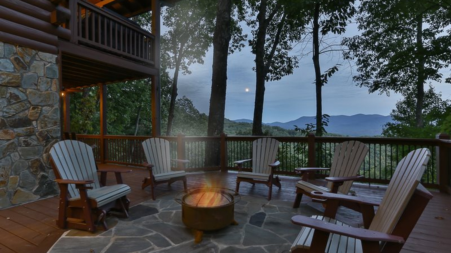 Fire pit evenings under the trees with the mountains fading into blue.